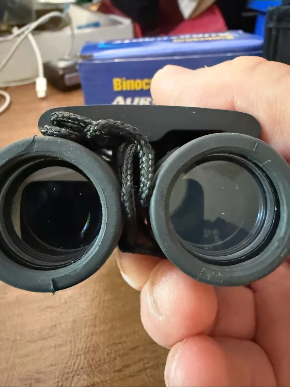 Aurosports 30x60 folding binoculars with a carrying case and cleaning cloth